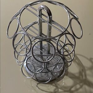 Elegant Silver Metal coffee pod holder that spins